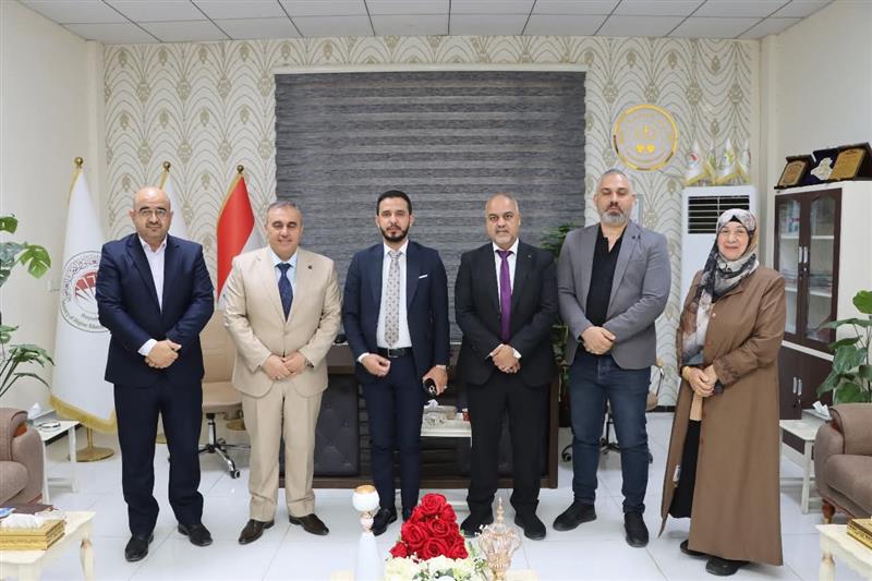 زيارة وفد من الكلية إلى كلية الإمام الجامعة